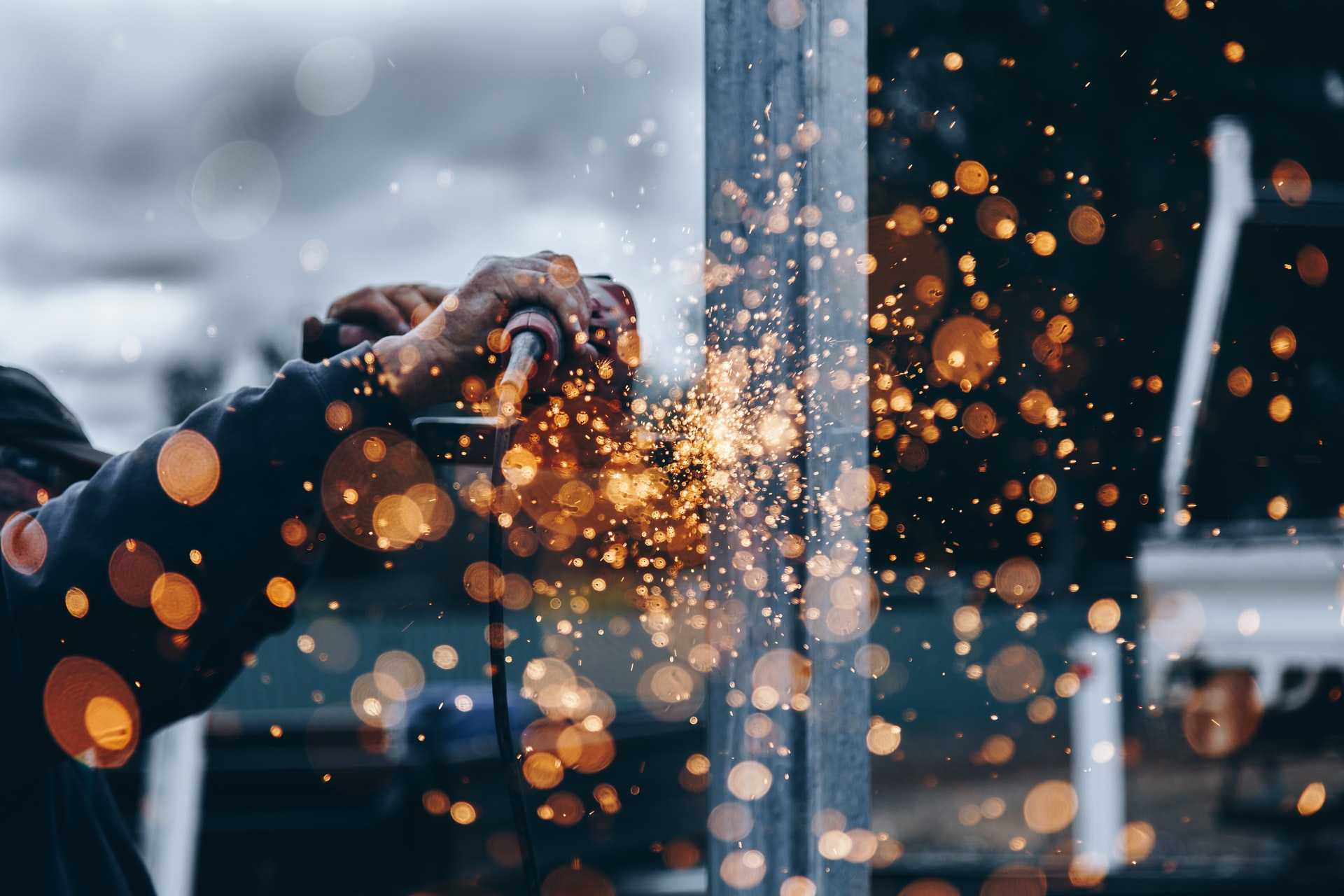 Skilled Worker cutting metal